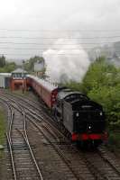 Empty coaching stock en route to the station at Fort William Junction.<br><br>[Ewan Crawford 28/05/2006]