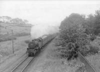 42216 approaches Ravenscraig with Wemyss Bay train.<br><br>[John Robin 13/08/1963]