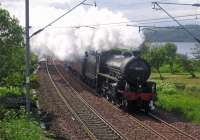 61264 passes Cardross, bringing the Jacobite stock up from Carnforth. May 25, 2006.<br><br>[Andy Kirkham 25/05/2006]