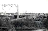 Airdrie - Helensburgh Express train leaving Cardross.<br><br>[G H Robin collection by courtesy of the Mitchell Library, Glasgow 26/11/1960]