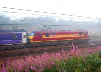 90031 draws to a halt well beyond the platform at Carstairs with the 15 coach Lowland Sleeper from Euston in preparation for the removal of the Edinburgh portion.<br><br>[John Furnevel 08/08/2006]