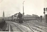 Approaching Saltmarket Junction. Class 2 4.6.0 40621 with empty stock for 7.10pm Kilmarnock. [See image 9654]<br><br>[G H Robin collection by courtesy of the Mitchell Library, Glasgow 11/06/1957]