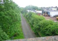 Abandoned and overgrown platform at Forrestfield station in June 2006, looking east towards Bathgate. The trackbed here is now part of a walkway/cycle path. [See image 35823]<br><br>[John Furnevel 02/06/2006]