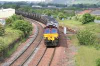 EWS 66048 brings a coal train through Niddrie West Junction in June 2006 heading for Millerhill.<br><br>[John Furnevel 16/06/2006]