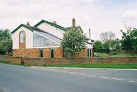 Pickhill Station looking north towards Newby Wiske and Northallerton in May 2006. The level crossing used to be in the foreground.<br><br>[Clive Barlow 25/05/2006]