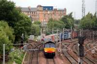 Eastbound WH Malcolm train from Elderslie passes Larkfield Junction.<br><br>[Ewan Crawford 20/06/2006]