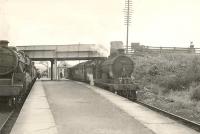 C.R. 4.4.0 54470 on Black Isle train. 5P 4.6.0 45460 on Wick train. Muir of Ord 1950.<br><br>[G H Robin collection by courtesy of the Mitchell Library, Glasgow 01/07/1950]