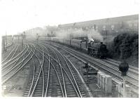 Passing Larkfield Junction. 73109 takes the original Polloc and Govan route with C.T.A.C. Leicester-Gourock train.<br><br>[G H Robin collection by courtesy of the Mitchell Library, Glasgow 08/08/1964]