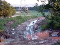 Site of Kilbagie station (left) looking south to Kincardine. Drainage works continue.<br><br>[Ewan Crawford 01/07/2006]