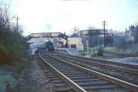 An East Kilbride train calls at Giffnock in April 1966. Note the locomotive's  Caledonian semaphore route indicator and the line to Giffnock quarry on the right.<br><br>[John Robin /04/1966]