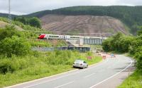 A northbound train crossing Harthope Viaduct, complete with its new deck, photographed looking south on 13 July 2006. Contractors are still on site and road traffic restrictions are still in place.<br><br>[John Furnevel 13/07/2006]