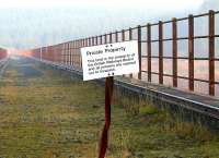 Twisted sign - seen through the safety railings of Big Water of Fleet Viaduct. November 2005.<br><br>[John Furnevel 12/11/2005]