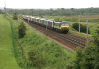 Glasgow portion of the <I>Lowland</I> Sleeper passing Ravenstruther on 11 July 2006. Locomotive is 90022.<br><br>[John Furnevel 11/07/2006]