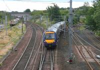 Stranger on the sub. A Queen Street - Waverley service crossing from the sub onto the ECML at Portobello on 9 July 2006, having been diverted via the circular route due to engineering works at Haymarket. <br><br>[John Furnevel 09/07/2006]
