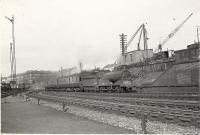 C.R. 0.6.0 57555 on 5.51pm. Kirkhill train passing Pollokshields (East) Junction.<br><br>[G H Robin collection by courtesy of the Mitchell Library, Glasgow 27/08/1957]