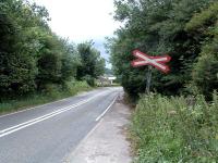 Porthywaen level crossing looking west. On the short section of connecting line between Blodwell and Llynclys Junction.<br><br>[Ewan Crawford 10/07/2006]