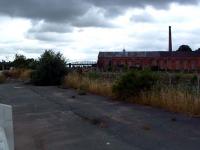 Looking north at Oswestry at the footbridge over to the Cambrian Railways works. These were on the eastern side of the line.<br><br>[Ewan Crawford 10/07/2006]