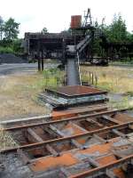 Coal loading from railway to trucks for local distribution in the goods yard at Gobowen station.<br><br>[Ewan Crawford 10/07/2006]