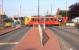A southbound Tyne & Wear Metro service on the level crossing at Callerton Parkway on 10 May 2006. <br><br>[John Furnevel 10/05/2006]